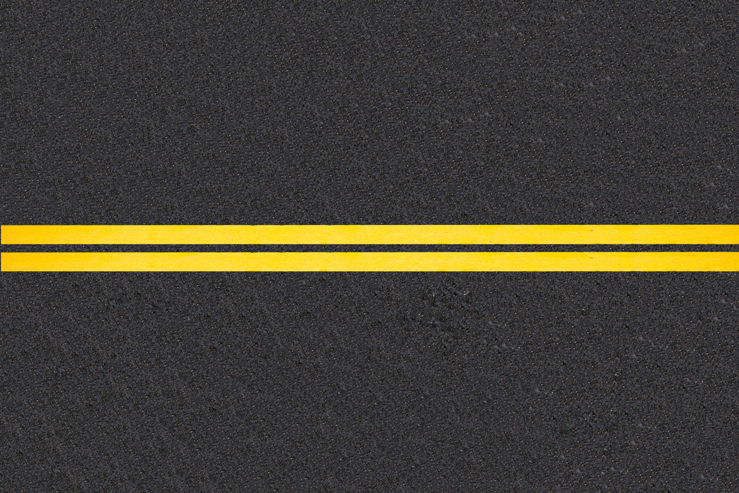 lines of traffic on paved roads background